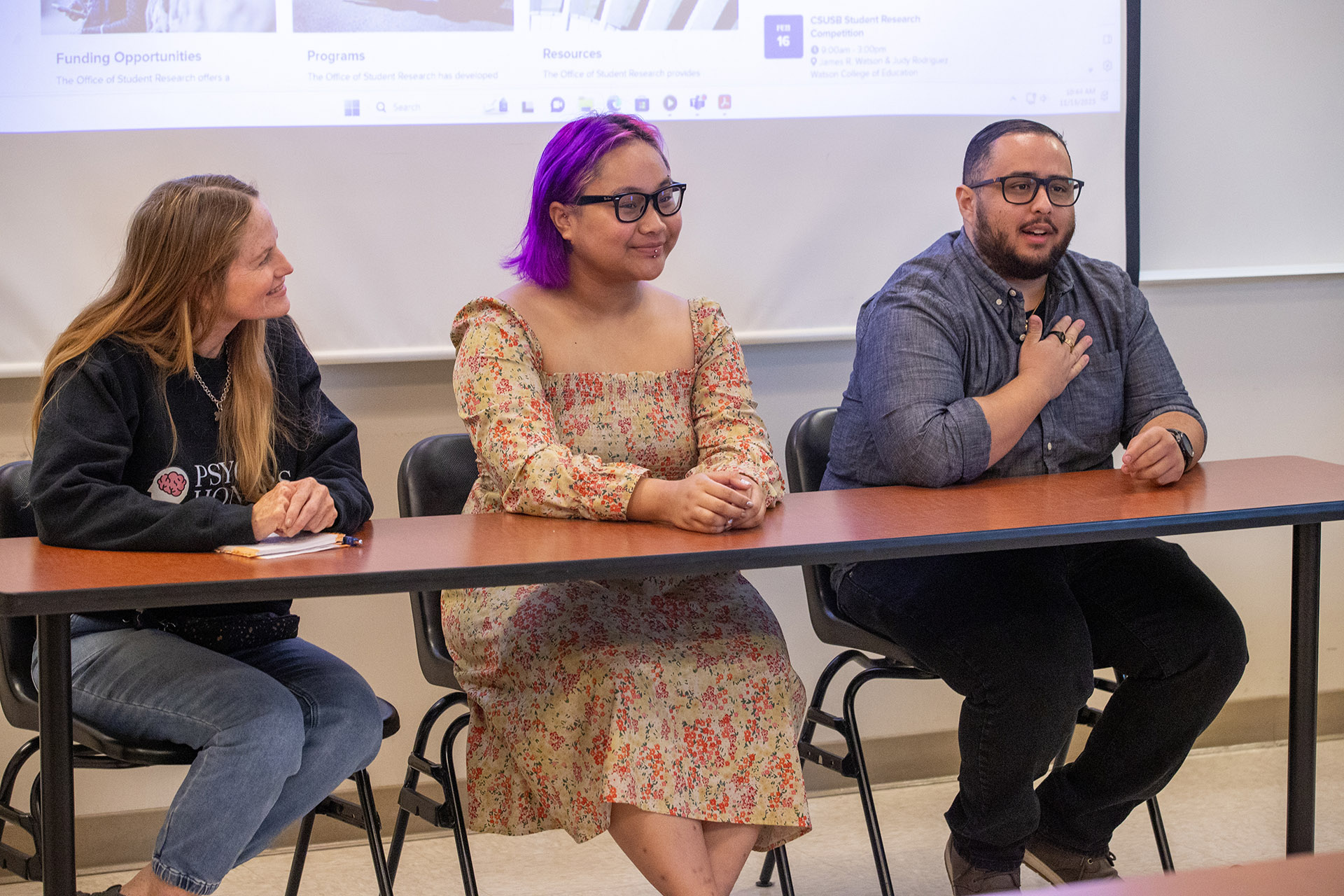 Students Michael Rubalcava, Camille Scrimshire and Serenity Chavez participating in discussion panel.