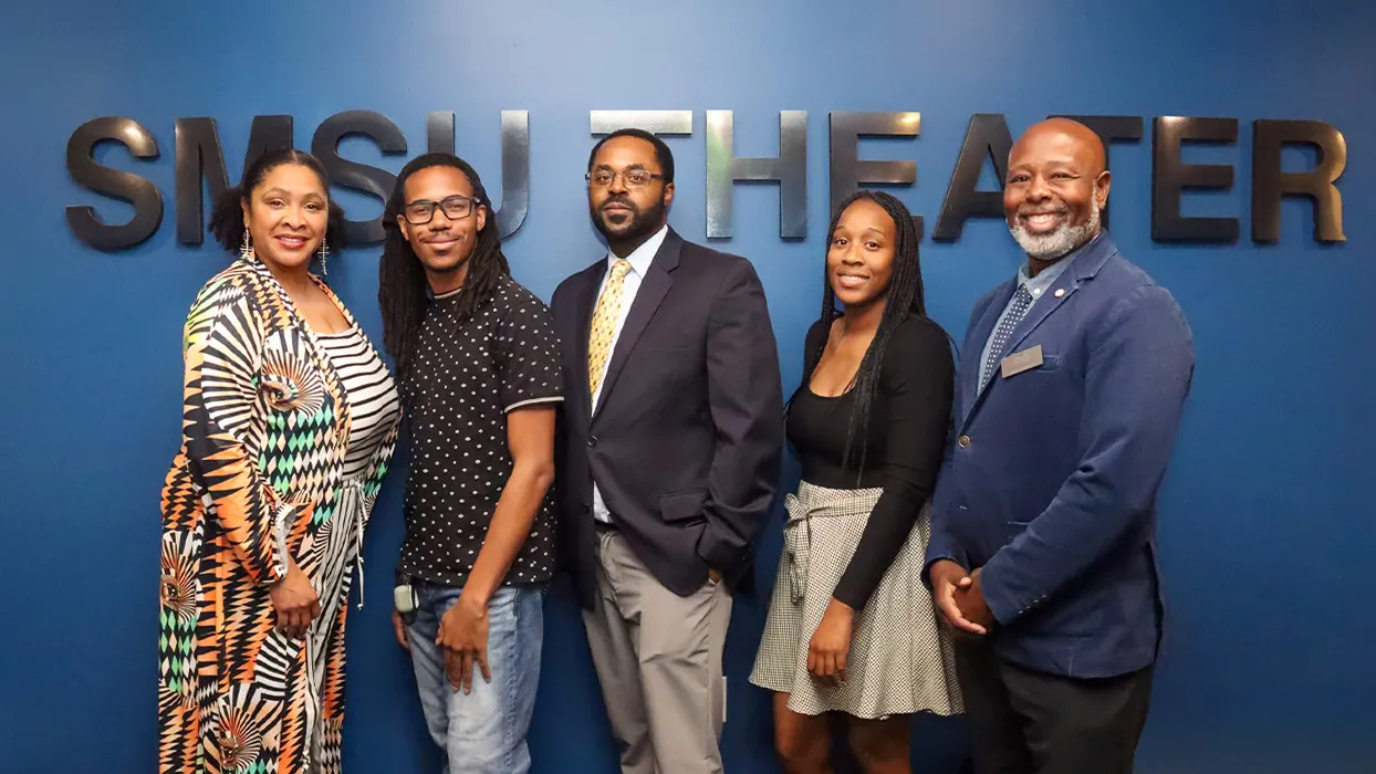 The Black Faculty Promotion Celebration honored Marc Robinson, center, associate professor of history, for his hard work, dedication and contributions to the academic community, as well as strengthened the social network that supports Black success at CSUSB.