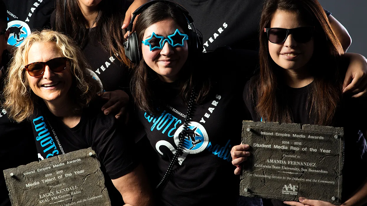 Two CSUSB alumni, Amanda Fernandez ’16 and Aimee Alvarez ’11, who met in 2015, have partnered with the Department of Communication and Media on a new initiative, "Coyotes to Hollywood and Beyond." Fernandez and Alvarez worked together at Coyote Radio (from left: Lacey Kendall, Alvarez and Fernandez), which won an Inland Empire Media Award in 2015.  