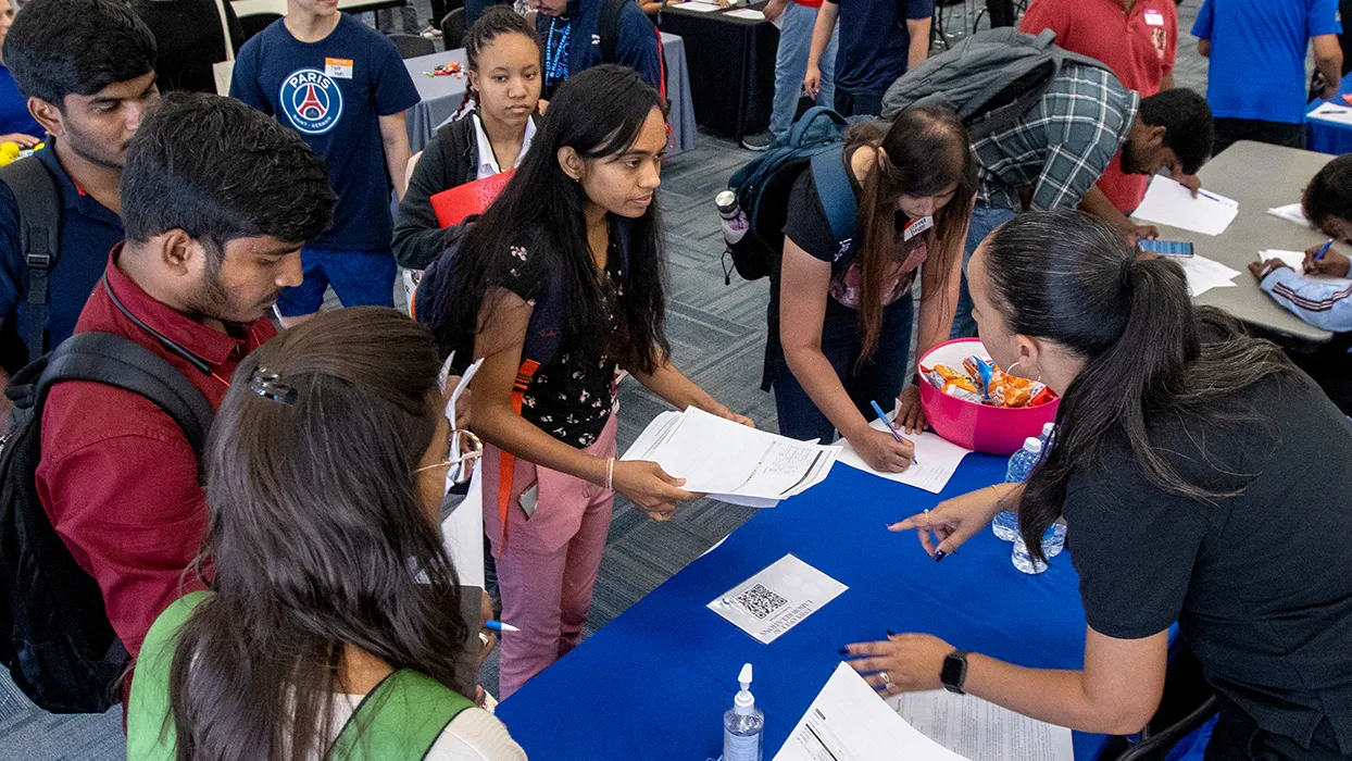 Students attend a fair to learn about the resources available to them.