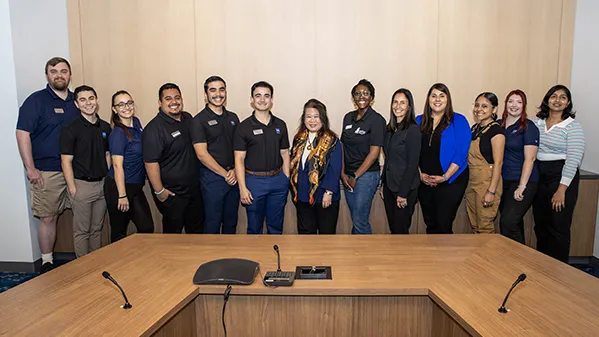 CSU trustees Darlene Yee-Melichar (center), Leslie Gilbert-Lurie (fifth from right) and Yammilette Rodriguez (fourth from right) meet with CSUSB Associated Students Inc. officers.