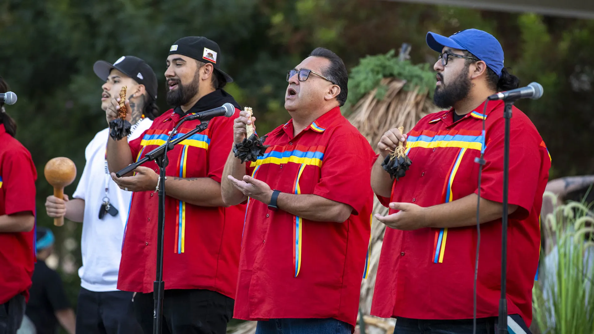 Assemblymember James Ramos (second from right), a CSUSB graduate, leads a group in singing bird songs during the 2024 California Native American Day celebration at California State University, San Bernardino. This year’s celebration is set for today, Friday, Sept. 26.