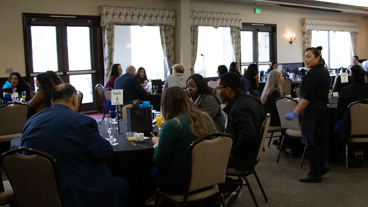 MBA alumni and students engaged in animated conversation during Sunday’s Business Brunch.