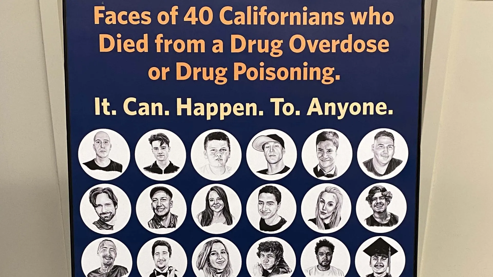 A sign for the INTO LIGHT exhibit