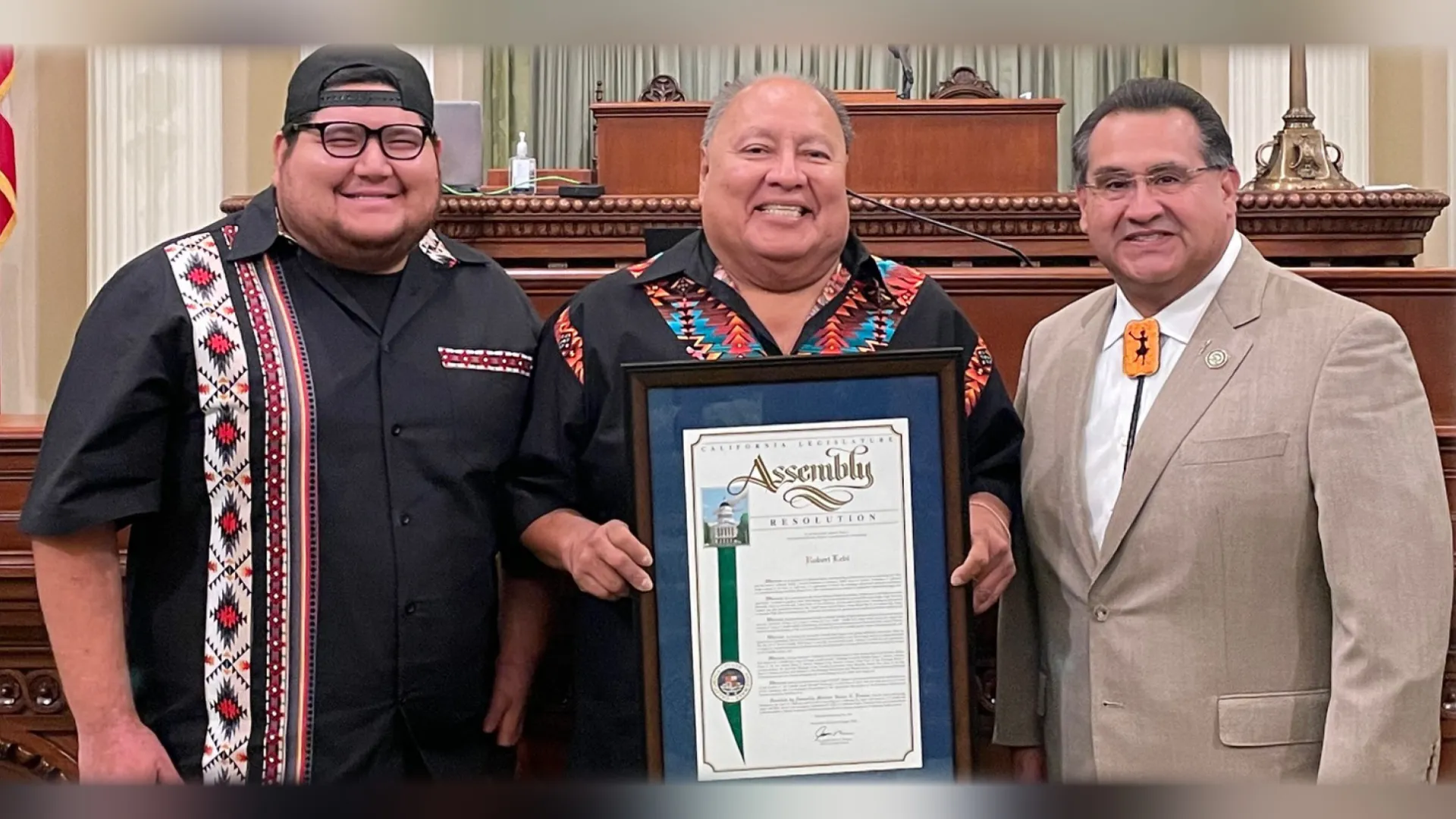 From left, Robert Levi III, Robert Levi Jr., and Assemblymember James Ramos.