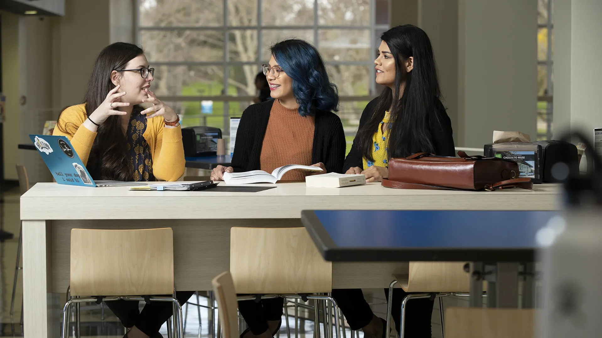 Three students seated