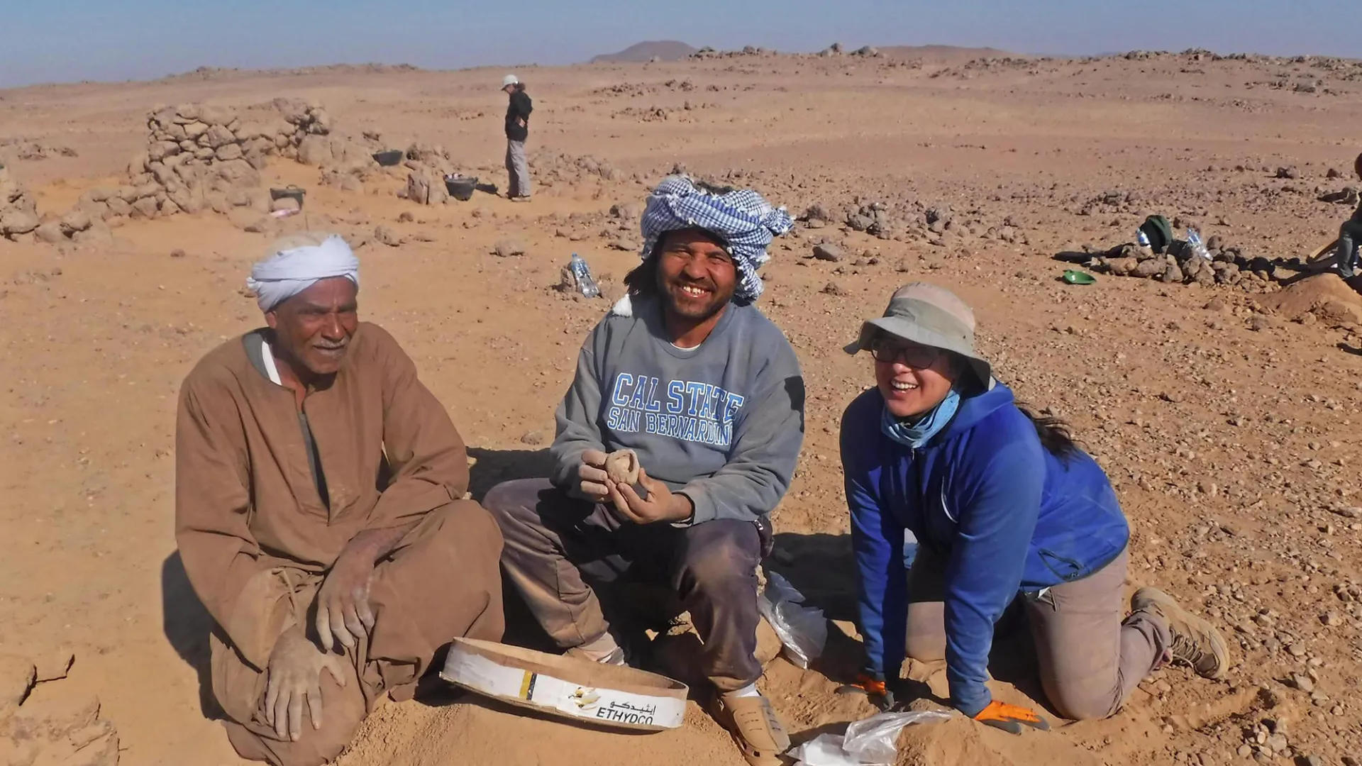 Some of the members of Wadi el-Hudi Expedition at archaeological excavation site in Egypt.