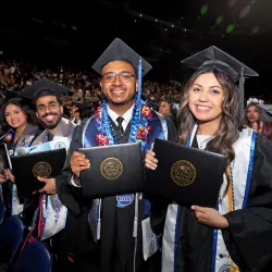 Students celebrate at the 2023 College of Natural Sciences Commencement ceremony at the Toyota Arena.