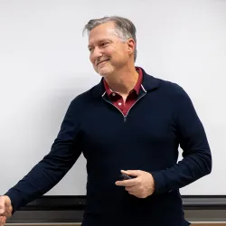 CSUSB President Tomás D. Morales congratulates Matthew Habich, a lecturer in the Jack H. Brown College of Business and Public Administration, on winning the 2023-24 Outstanding Lecturer Award.