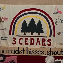 An image of a quilt honoring AIDS victims.