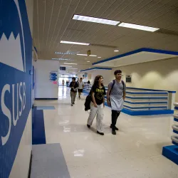 Students walk through University Hall.