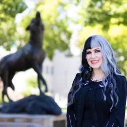 Jennifer Negrete Magnant at the Wild Song sculpture at CSUSB.