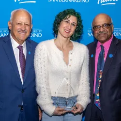 Lúa López, center, with CSUSB President Tomás Morales, left, and Sastry Pantula, dean of the College of Natural Sciences. She was named CSUSB’s 2024-25 Outstanding Faculty Advisor.