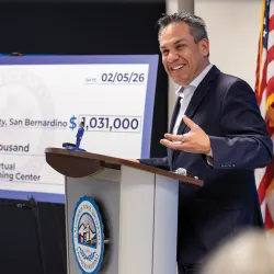 U.S. Rep. Pete Aguilar (CA-33), standing next to a ceremonial check for CSUSB’s Center for Cyber and AI, announces the awarding of the $1,031,000 grant to fund the Artificial Intelligence and Virtual Reality Research and Retraining Center at CSUSB.