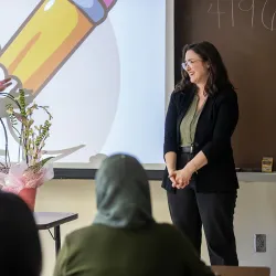 Rafik Mohamed, left, provost and vice president of Academic Affairs, presented Stacy Morris, assistant professor of child, adolescent, and family studies, with the 2025-26 Outstanding Faculty Advisor Award on April 23 for her dedication to CSUSB students and impactful advising. 
