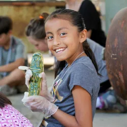 Girl participating in RAFFMA's Kids Discover Egypt Workshop.