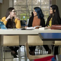 Three students seated