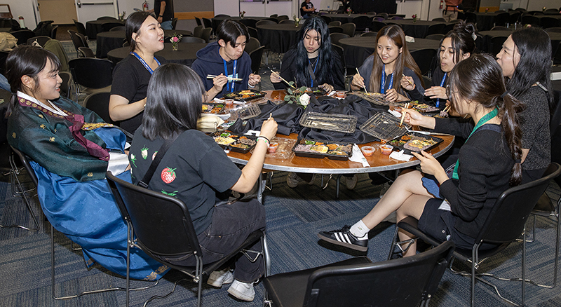 Attendees enjoyed traditional Korean cuisine, including bap, rice, and banchan, side dishes, served along with Korean beverages and sweets.