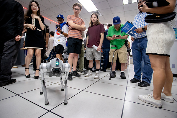 The robot dog fascinated guests at CSUSB’s Center for Cyber & AI open house.