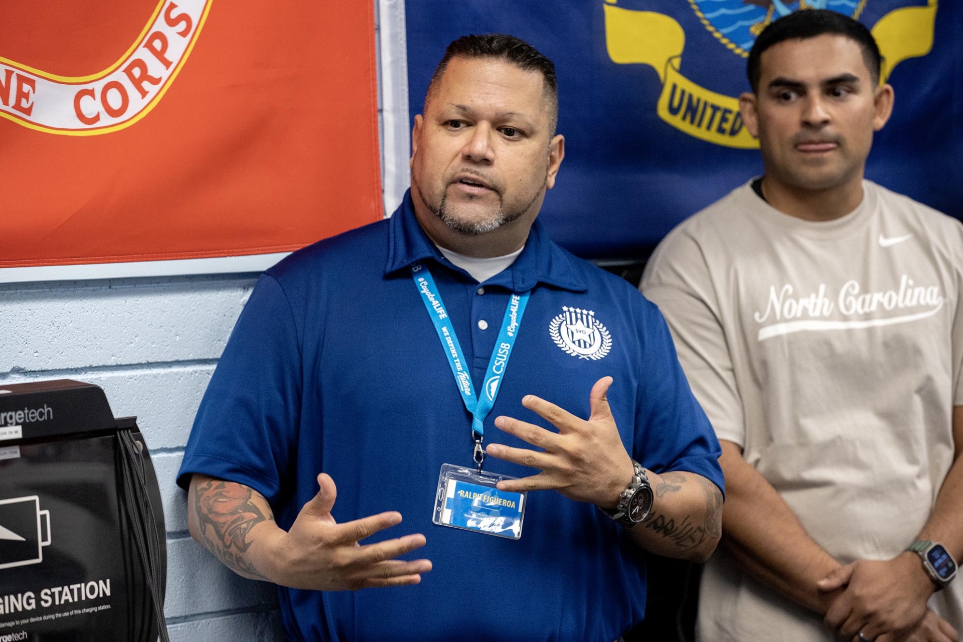 Ralph Figueroa (left) speaks during a visit by U.S. Rep. Mark Takano (CA-39) to the CSUSB Veterans Success Center in September 2023.