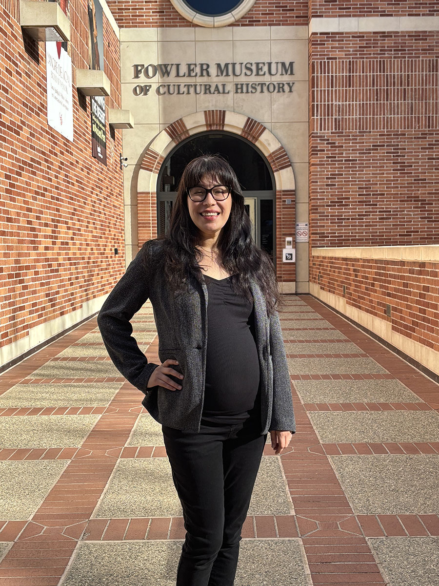 Daisy Ocampo Diaz at UCLA’s Fowler Museum of Cultural History, where an exhibit she helped curate, “Fire Kinship: Southern California Native Ecology and Art,” is on display through July 13.  Assisting her were CSUSB history graduate student research assistant Lina Tejeda (Pomo) and Michael Chavez (Gabrieleno-Tongva), former Fowler Museum archaeological collections manager and CSUSB NAGPRA program manager. 