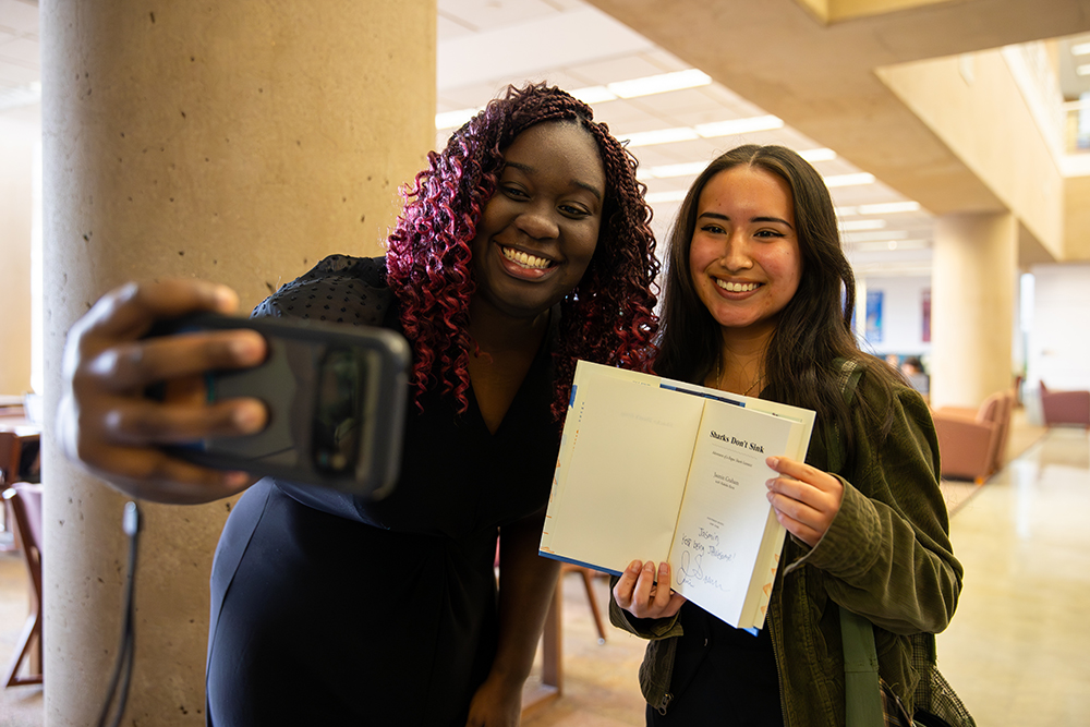 Graham took selfies with CSUSB students at her book giveaway and signing.&nbsp;