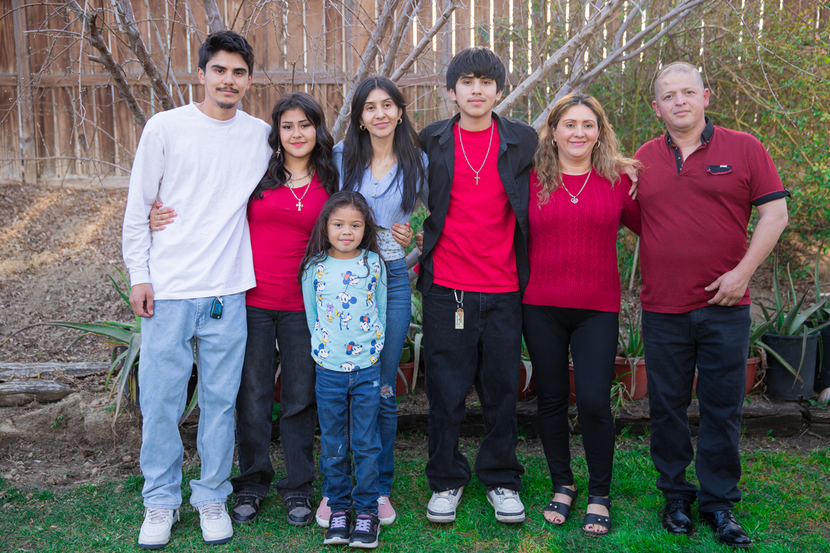 Cornejo, third from left, with her daughter, several of her siblings and her stepfather and mother. 
