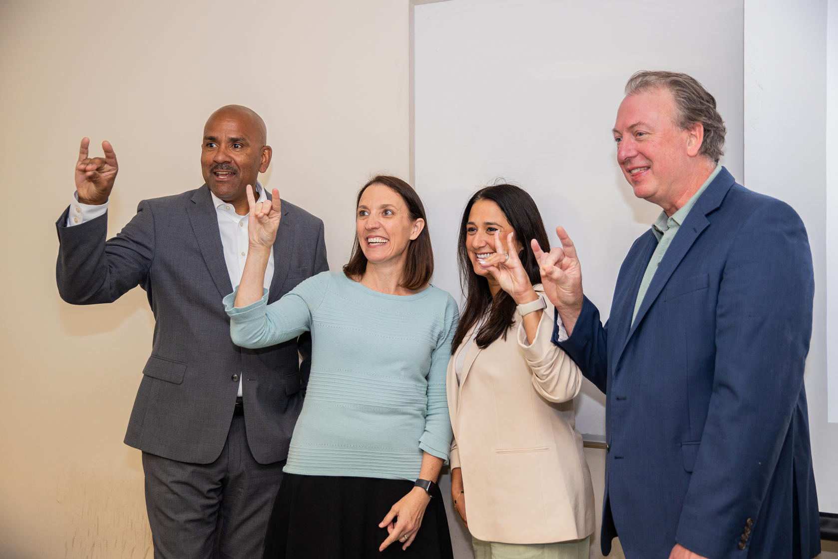 From left, Mohamed, Liszka, Christina Hassija, dean of the College of Social and Behavioral Sciences, and Brian Janiskee, interim chair for the Department of History. 