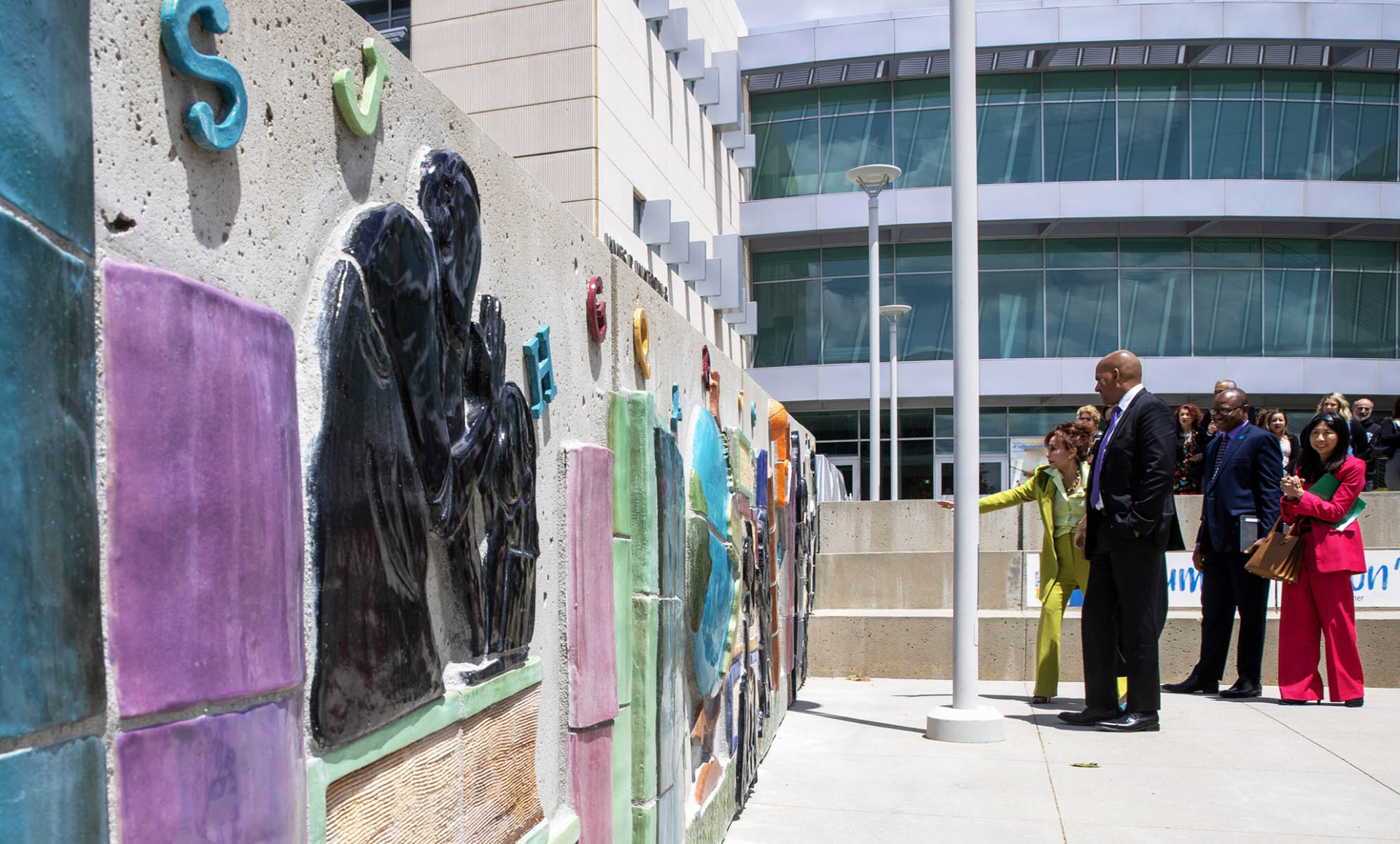 “Eternal Learning,” outside the James R. Watson and Judy Rodriguez Watson College of Education, is mural consisting of 850-square-feet of ceramic tiles that depicts humans at work, study and play. 