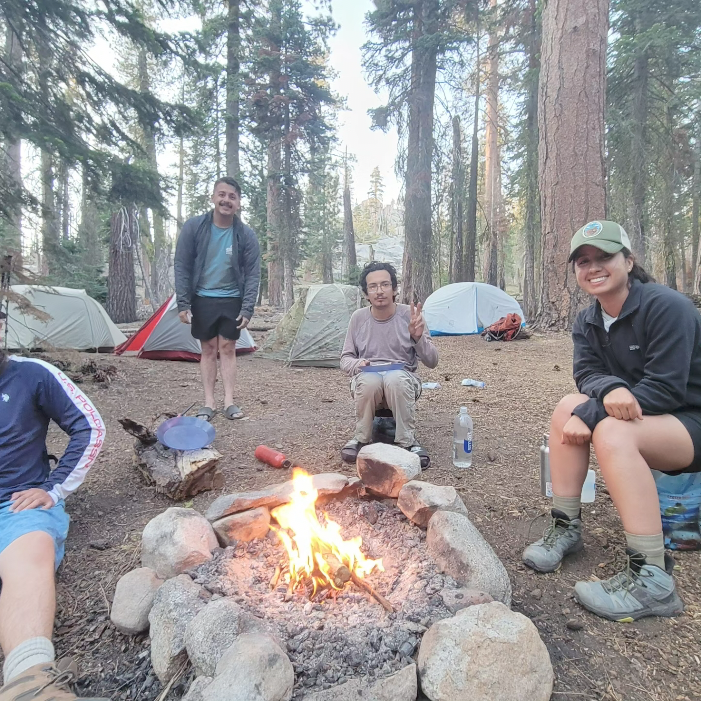 sitting around campfire 